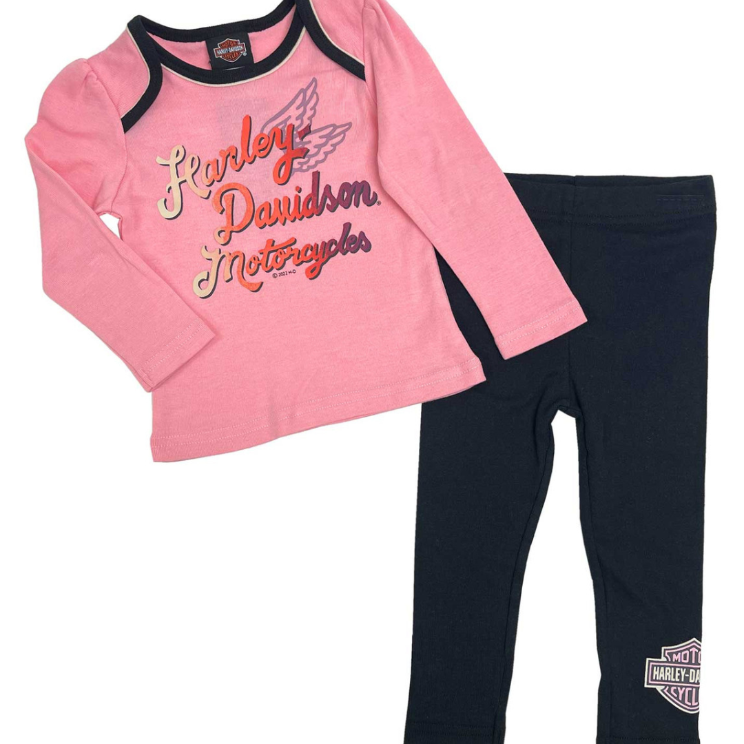 Pink long-sleeve shirt and black leggings with Harley Davidson logo on a white background