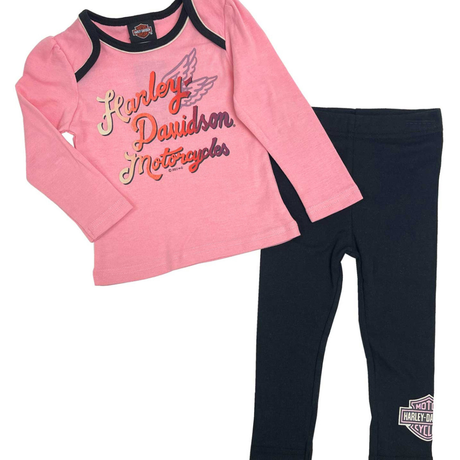 Pink long-sleeve shirt and black leggings with Harley Davidson logo on a white background