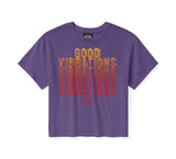 Purple t-shirt with 'Good Vibrations' text design on a white background