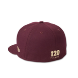 Black cap with '120 Years' text and New Era logo on a white background