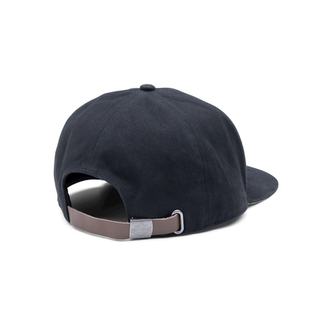Black cap with a brown brim on a white background