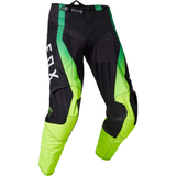 Black and green motocross pants with Fox logo on a white background