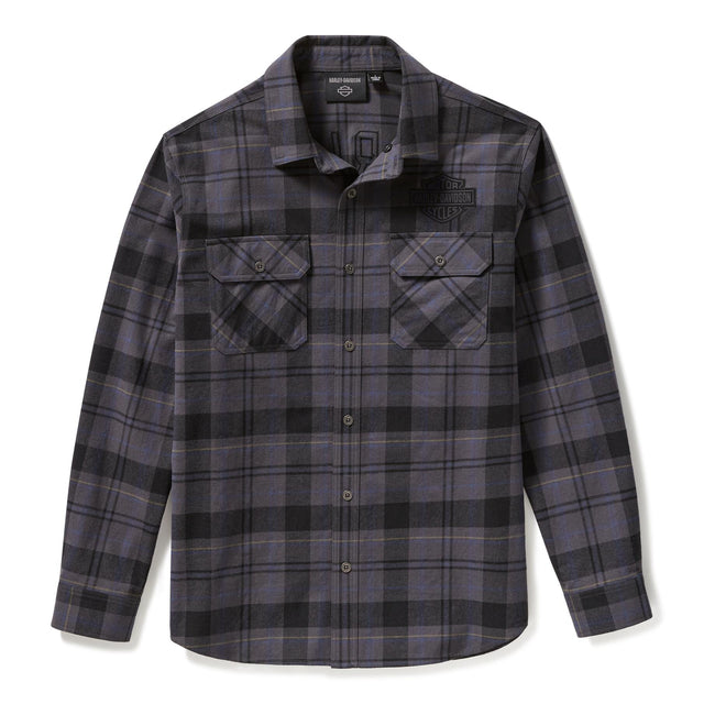 Plaid shirt with button details on a white background